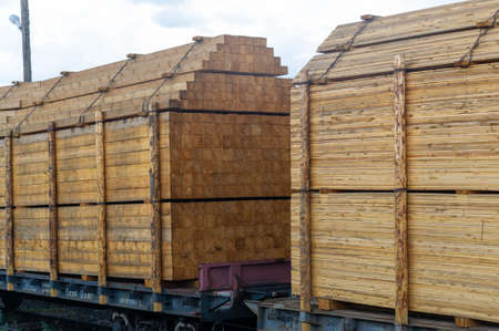 transportation of lumber by rail. Lumber is packed for shipmentの写真素材