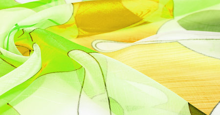 green, white and yellow geometric colors, similar to a veil of fine rayon silk. organza pattern....
