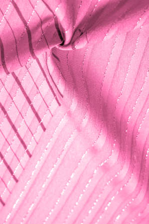 red cerise fabric with lurex stripes, perfect for a fresh and comfortable style. Design background textureの写真素材