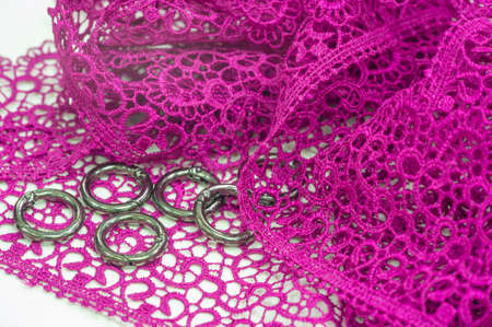 The ribbon is altered in dark pink. Use it to complete your work with an elegant decoration. Create bows, borders and planks to complete your most glamorous and sparkling designs.の写真素材