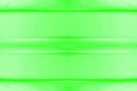 Texture, background, pattern. Green silk fabric. It has a smooth matte finish and is suitable for your design.の写真素材