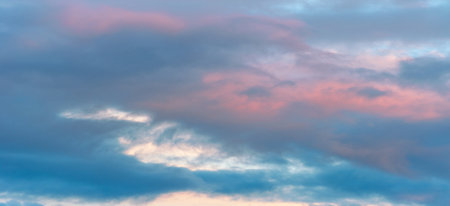 Sky with clouds at sunset as a background. Nature composition. Panoramic image.の写真素材