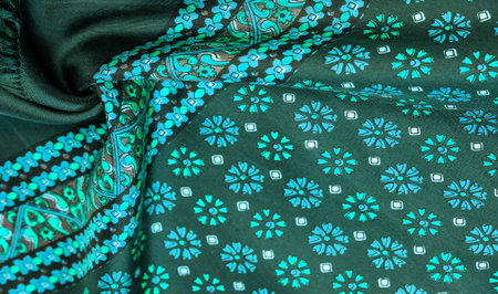 Texture, background, pattern, green silk fabric with a print of blue flowers, geometric pattern,...