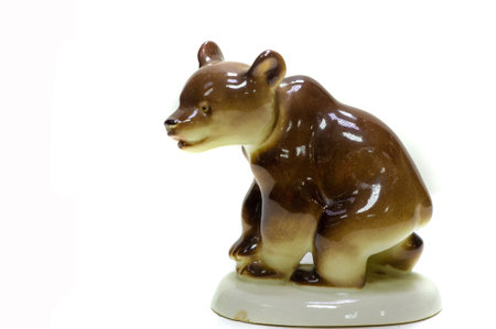 Bear ceramic figurine isolated on white background, clipping path included.の写真素材
