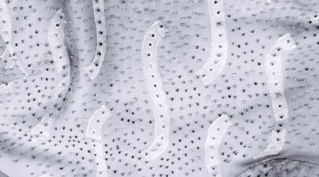 Seamless kaleidoscope. The fabric is silky white and gray. An ultra-modern print and a delicate,...