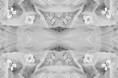 seamless. the black and white colors of the fabric are inlaid with flora and fauna.