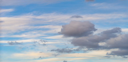 sky, Clouds float into my life, not to bring rain or cause a storm, but to add color to my sunset sky. The sun always shines above the cloudsの写真素材