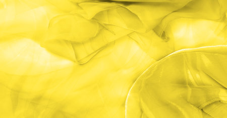 seamless kaleidoscope, yellow silk. A sunny golden yellow silk faucet is all you need for a stylish presentation.の写真素材