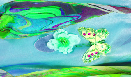 seamless. The blue-green colors of the fabric are inlaid with flora and fauna.の写真素材