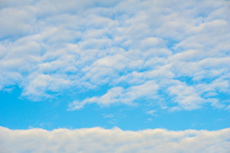 Beautiful natural scenery of clouds against blue sky Vibrant colors of sunrise and sunset Art of...
