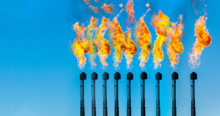 Industrial flares oil production, Reduce emissions and environmental impact. Improve safety protocols at oil production facilities. Effectively burn excess gas generated during processing.の写真素材