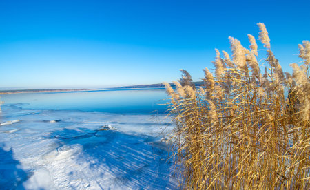 the beauty of winter with your camera. Explore frozen landscapes and unique photo opportunities in December. Freeze the moment when the ice freezes the river. unripe ice on an icy river.の写真素材