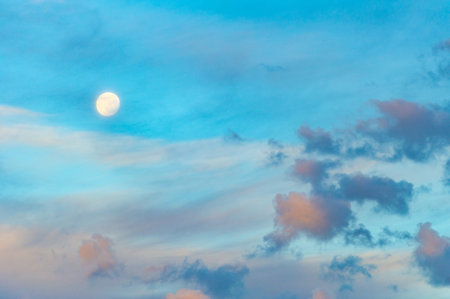 sky, Clouds float into my life, not to bring rain or cause a storm, but to add color to my sunset sky. The sun always shines above the cloudsの写真素材