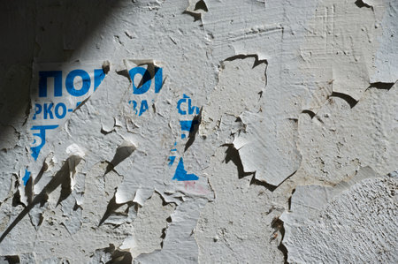 Vintage advertisements on the wall create a nostalgic atmosphere. Adds a unique retro touch to any space. Ideal for creating a themed decor or setting.の写真素材