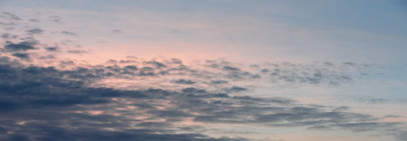 Photo of the sky with clouds, sunrises, sunsets, orange-yellow tones from the setting sun
