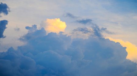 sky, Clouds float into my life, not to bring rain or cause a storm, but to add color to my sunset sky. The sun always shines above the cloudsの写真素材