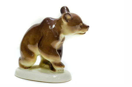 Isolated over white background. figurine of a bear, glazed ceramicsの写真素材
