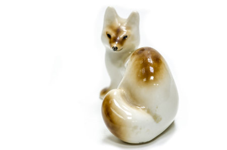 Unique antique cube figurine made of glazed ceramics. A rare and valuable addition to any collection. Artfully crafted with intricate details and high quality materials.の写真素材