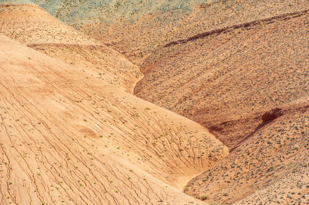 Texture and background inspired by the Red Mountains of Boguty. The red clay aesthetic brings a natural and rustic element to the design. Ideal for creating earthy and warm visual effects.の写真素材