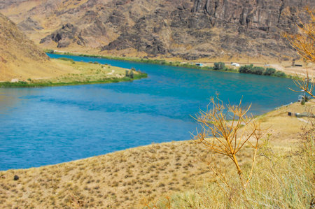 A source of refreshing water during the hot summer months. The sound of the flowing river creates a calm atmosphere.の写真素材