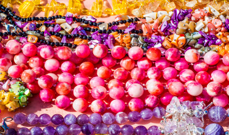 semiprecious stones. Beads pendants decoration. Semi-precious stones are hard gemstones created organically. including lava or ocean hotspots, mines and shells.の写真素材
