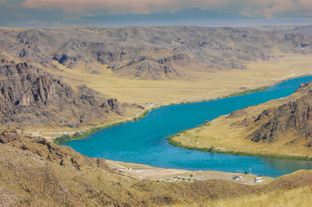 Enjoy the beauty of the river and its blue waters. Relax by the calm waters and listen to soothing sounds. Explore unique rock formations along the river banks.の写真素材