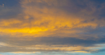 sky, Clouds float into my life, not to bring rain or cause a storm, but to add color to my sunset sky. The sun always shines above the cloudsの写真素材
