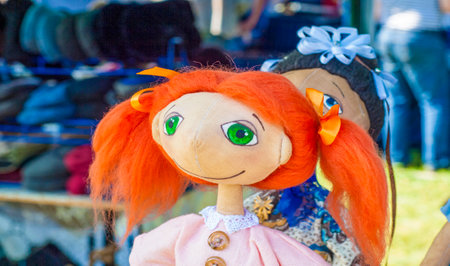 Handmade dolls, many toys in. some colored rag dolls, Cute handmade toys of glovesの写真素材