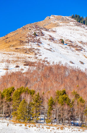 mountains winter and snow. Nothing lives long, Only earth and mountains. If you think you've reached your peak, find a new oneの写真素材