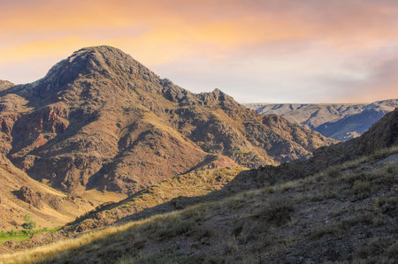 Enjoy the serene beauty of the river surrounded by rocks. An ideal location for outdoor activities such as hiking and picnics. An ideal place to relax and unwind in the silence of nature.の写真素材