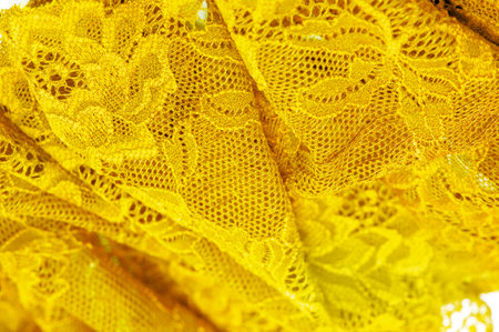 Fashionable and decorative yellow lace Can be used as an elastic band or home decor Adds texture to designs, backgrounds and patterns Jacquard design adds unique detail to any garmentの写真素材