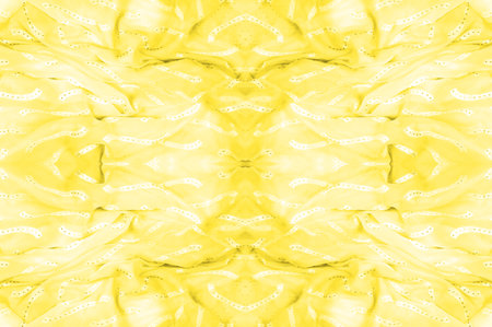 seamless kaleidoscope, yellow silk. A sunny golden yellow silk is all you need for a stylish presentation.の写真素材
