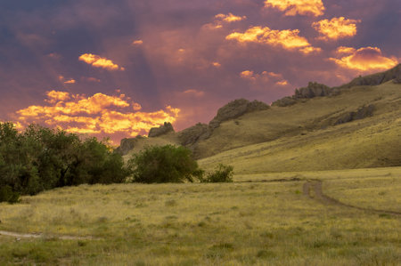Enjoy the breathtaking beauty of the steppe. Relax and unwind in the tranquil surroundings of nature. Witness stunning sunsets over cliffs and rivers. Reconnect with yourself and find inner peace.の写真素材