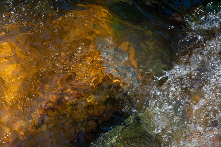 Experience the mesmerizing dance of water and stones. Witness the harmonious interaction of water...
