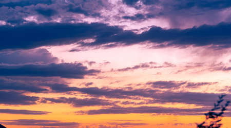 Clouds dawn sunset romance. Proof that few things in life are as beautiful as the setting sun. A picture of the perfect end to the dayの写真素材
