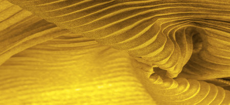 tissue, textile, cloth, fabric, web, texture, yellow gold corrugation fabric, undulation ripple waveの写真素材