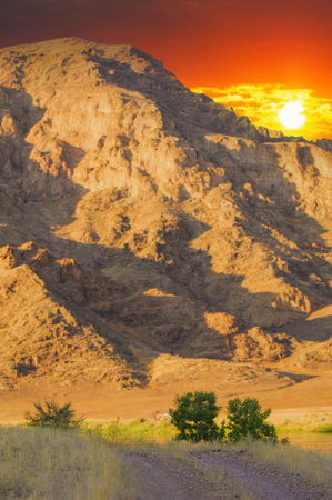 Enjoy the breathtaking beauty of the steppe. Relax and unwind in the tranquil surroundings of nature. Witness stunning sunsets over cliffs and rivers. Reconnect with yourself and find inner peace.の写真素材