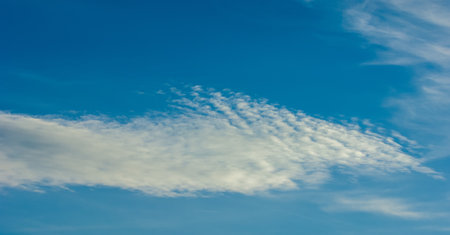 sky, Clouds float into my life, not to bring rain or cause a storm, but to add color to my sunset sky. The sun always shines above the cloudsの写真素材