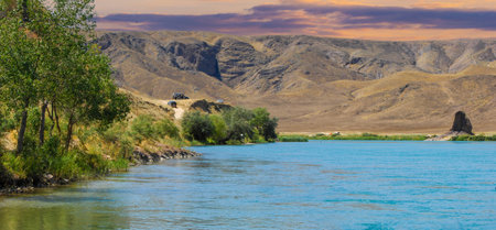 Experience the beauty of nature's power. Discover hidden gems on its shores. Feel calm by listening to soothing sounds.の写真素材