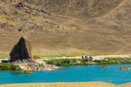 Refreshing summer waters flowing across the steppe. The natural beauty of rivers meandering among...