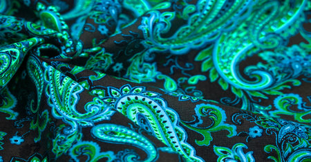 Paisley green pattern on black background In Chinese it is known as âham patternâ In Russia this pattern is known as âcucumbersâ. Boteh is a Persian word meaning bush, bunch of leaves or flower budの写真素材