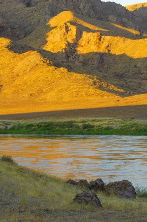 Enjoy the breathtaking beauty of the steppe nature. Take stunning photos of the jagged rocks Be mesmerized by the contrast of colors during sunset in the Wonders of Nature steppe.の写真素材