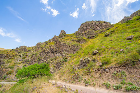 Ideal for off-road enthusiasts and adventure seekers. Explore rugged terrain and breathtaking views. Test your off-road driving skills in a natural environment.の写真素材