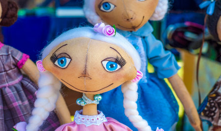 Handmade dolls, many toys in. some colored rag dolls, Cute handmade toys of glovesの写真素材