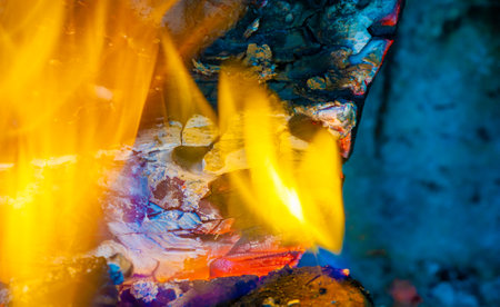 Create a warm and cozy atmosphere with a beautiful fire. Burning logs create natural warmth and atmosphere. Decorate your indoor or outdoor space with mesmerizing flickering flames.の写真素材