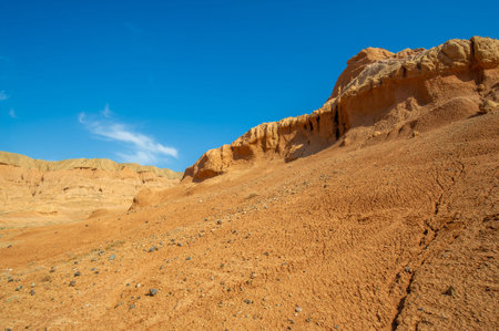 Enjoy the breathtaking beauty of the Red Bogut Mountains at sunset. Discover nature's vibrant...