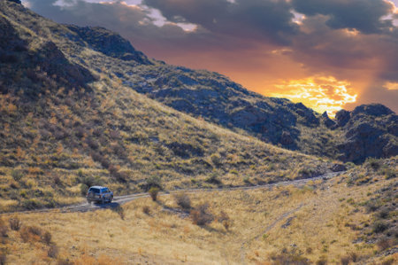 Enjoy the breathtaking beauty of the steppe. Relax and unwind in a picturesque setting. Watch the sun set over the rocks. Connect with nature and find inner peace.の写真素材