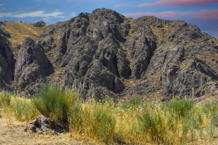 Enjoy the tranquil beauty of the steppe. Enjoy stunning views of cliffs, rivers and sunsets. Let yourself be enchanted by the picturesque landscapes. Feel the feeling of serenity and awesomeの写真素材