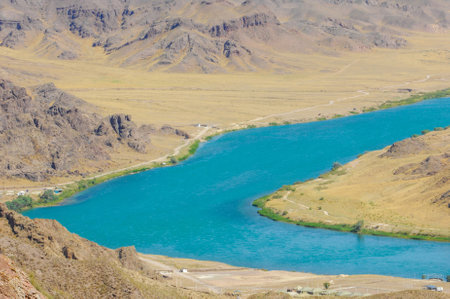 Explore the beauty of the river and its blue waters. Feel the tranquility of nature. Discover hidden treasures along the banks of the river. Ideal for fishing, kayaking or just relaxing by the water'sの写真素材