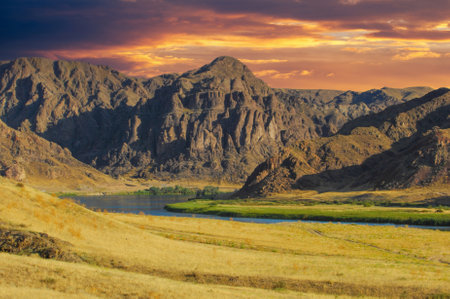 Experience the power and beauty of nature in the summer steppe. Explore the diverse ecosystem along the banks of the river. Ride the rapids for an adrenaline-pumping adventure.の写真素材